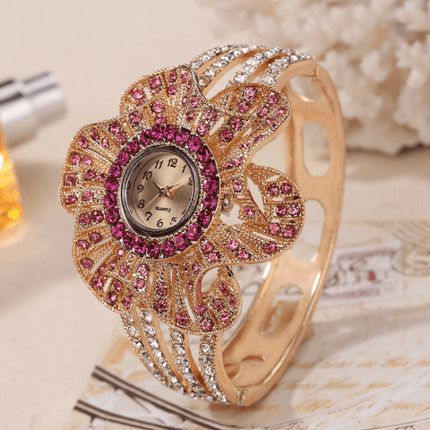 Fashion Crystal Flower Shape Dial Hollow Metal Strap Women Quartz Watch